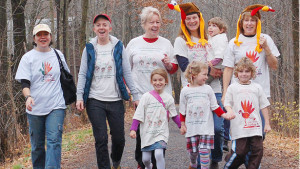 The annual New Paltz Turkey Trot will take place on Thanksgiving morning. Pictured (top row left to right): Suzanne Holt, Rachel Williams, Kathy Cartagena, Dawn Tomassi, Gray Lobell and Alyce Kosofsky. Bottom row (left to right): Tess Lobell, Thea Holt and Hawk Kosofsky. (photo by Lauren Thomas)